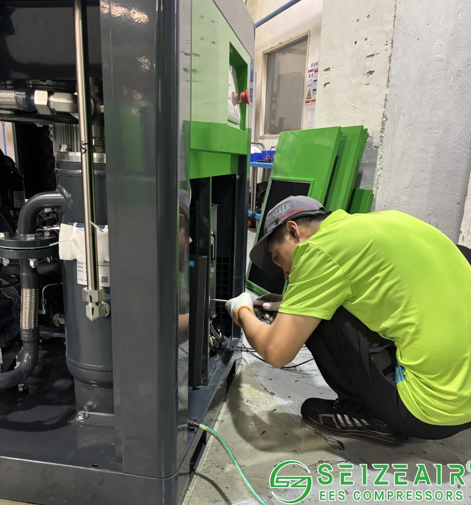 Seize Air technician performing routine air compressor maintenance