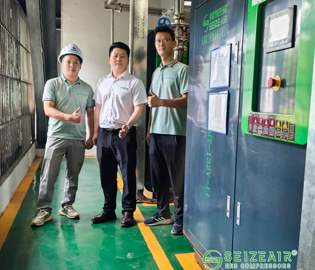 Long-lasting screw air compressor running in an industrial factory