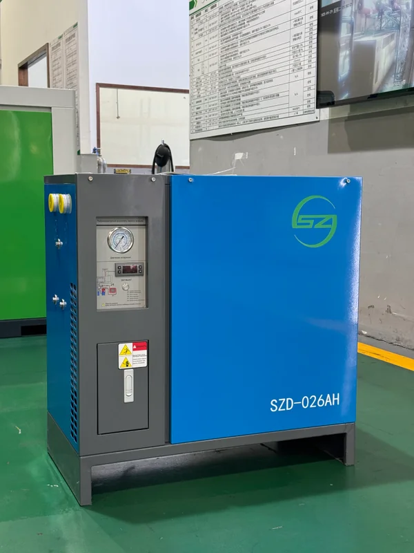 Blue refrigerated dryer module with control panel and pressure gauge, a standard module in a skid mounted air compressor station
