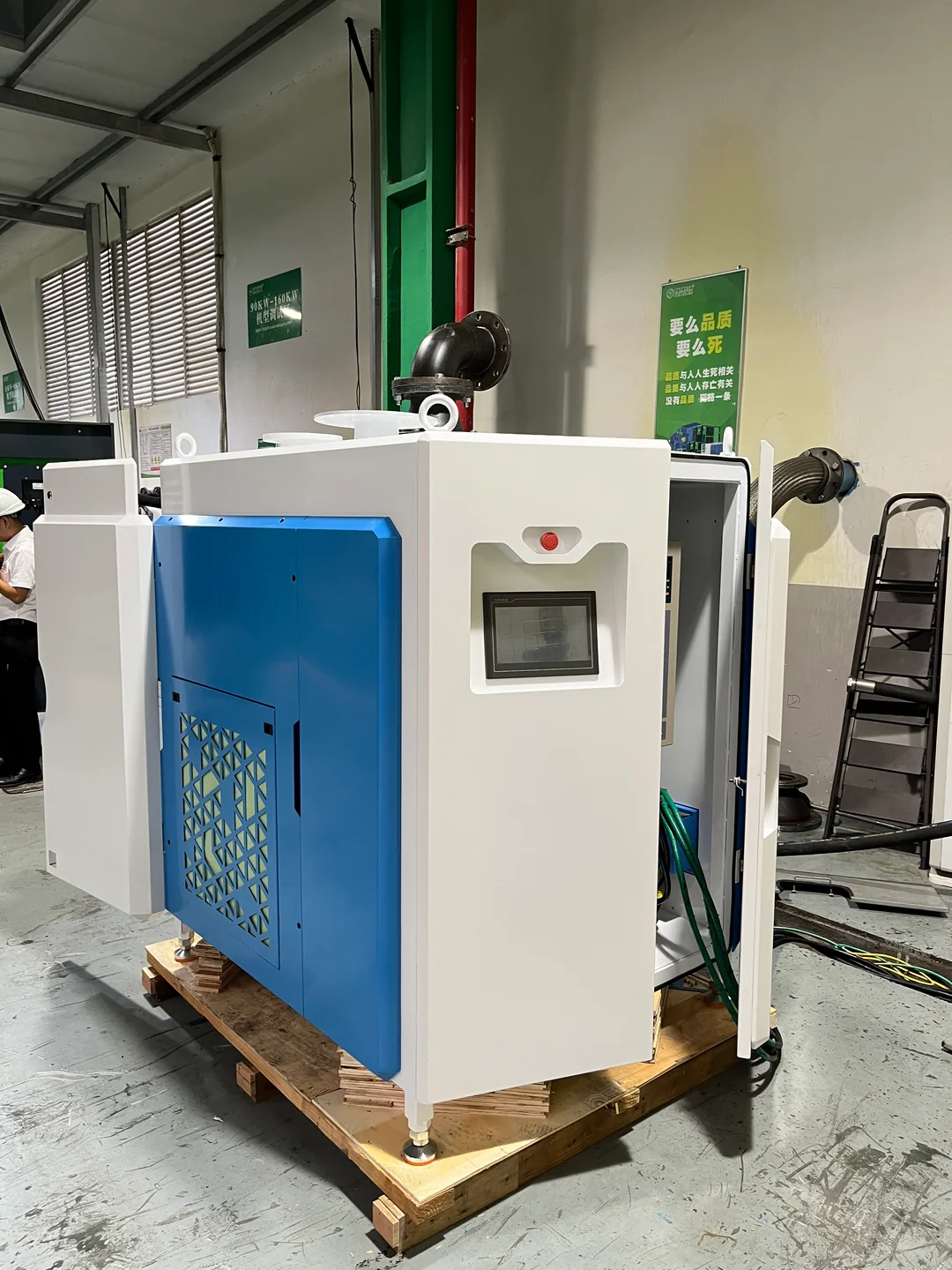Magnetic levitation blower installed in an industrial plant with its cabinet and pipework